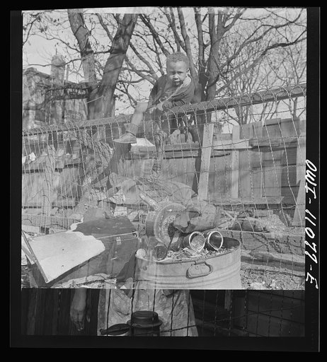 Untitled photo, possibly related to: Washington (southwest section), D.C. Two boys playing in their backyard