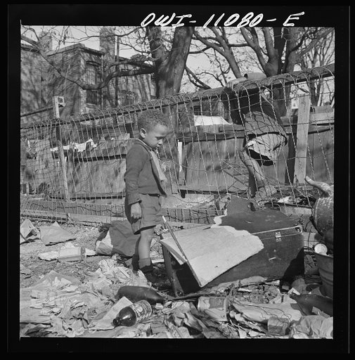 Washington (southwest section), D.C. Two boys playing in their backyard