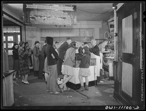 Lititz, Pennsylvania. Butcher shop of Benjamin Lutz (second from right) at 4:30 p.m. when shifts change at the factories. Although there is no scarcity of meat in Lancaster County yet, the wholesale price has risen as much as from five to eight cents a pound