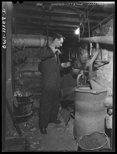 Lititz, Pennsylvania. This town of 400-odd inhabitants, has two weekly papers, the oldest of which is the Record-express. Pouring molten metal, to make plates from mats in the basement of the Record-express office building