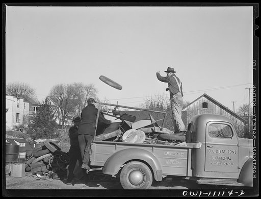 Lititz, Pennsylvania. Last scrap collection drive before spring. Citizens left their contributions on the curb in front of their houses where they were collected by local trucks which had volunteered their services. This one belongs to Mr. Diem, a farm machinery dealer