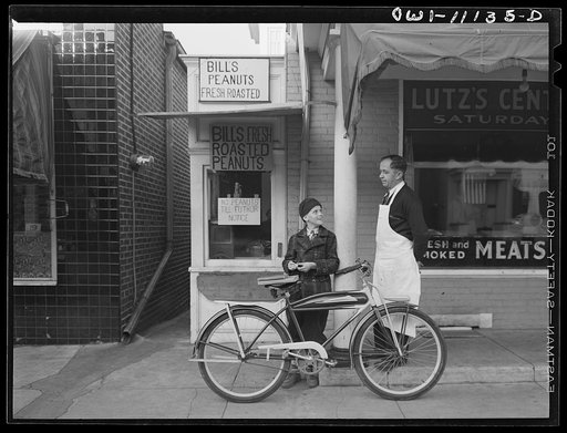 Peanut stand next to the Lutz butcher shop finds it hard to get peanuts since the war started. Peanut oil is needed in industry