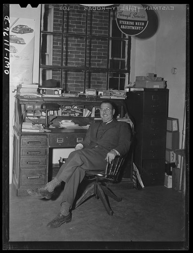 Untitled photo, possibly related to: Lititz, Pennsylvania, owner of the Pierson Motor Company, who has lost his business of selling cars. Repairs in his garage bring in enough to pay taxes and mechanics, so he had to get himself a defense job at the Armstrong Cork Company in Lancaster. He's an air r