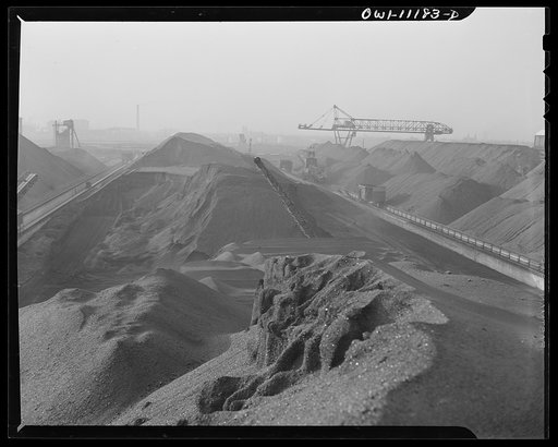 Hanna furnaces of the Great Lakes Steel Corporation. Detroit, Michigan. General view showing huge stockpiles of coal and iron ore