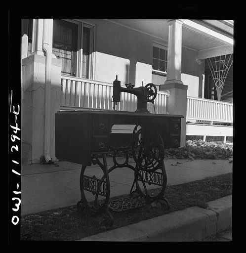 Lititz, Pennsylvania. In curb scrap collection drive, one housewife donated a sewing machine
