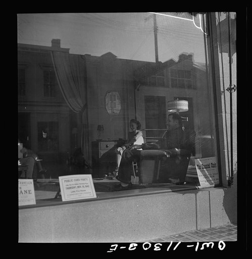 Lititz, Pennsylvania. During an air raid alarm, workers in this furniture store sat in the window display