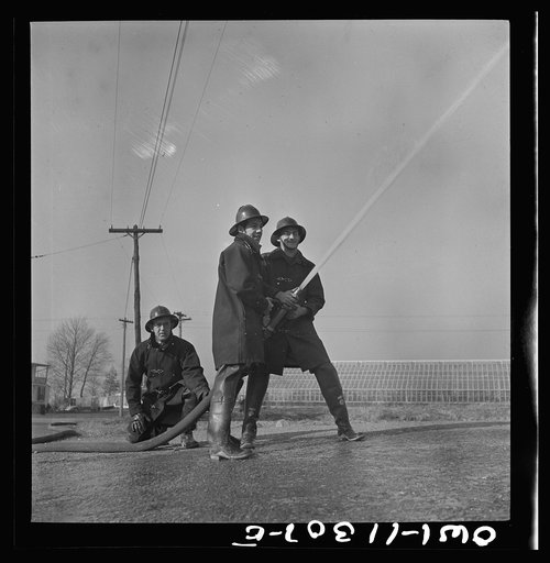 Untitled photo, possibly related to: Lititz, Pennsylvania. Volunteer firemen practicing during an air raid drill