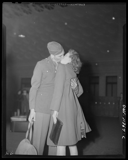 Washington, D.C. A soldier kissing his girl goodbye at Union Station