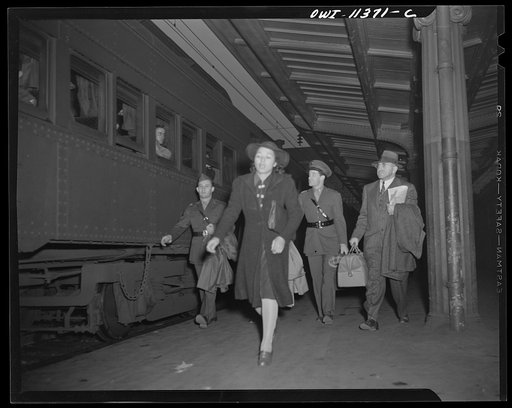 Untitled photo, possibly related to: Washington, D.C. Soldiers aboard a troop train waiting for it to pull out at the Union Station