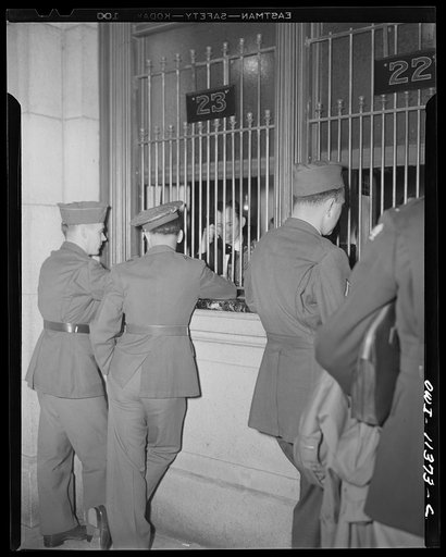 Washington, D.C. Soldiers waiting at the ticket window for transportation at Union Station