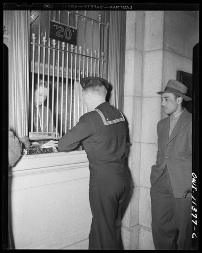 Washington, D.C. Sailor receiving his transportation at the ticket window at the Union Station