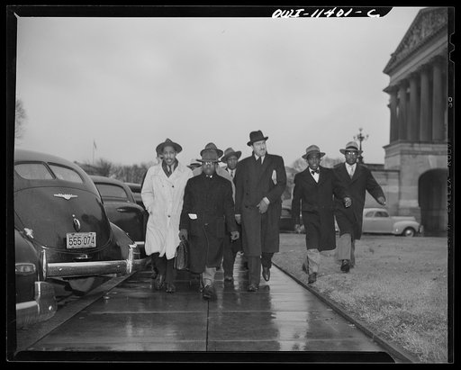 Untitled photo, possibly related to: Washington, D.C. Clayton Powell and the New York delegation on their way to protest against poll tax filibuster