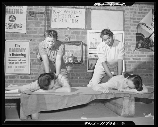 Washington, D.C. First aid class of the air raid warden unit in the Southwest area. Artifical respiration is demonstrated by two members of the class