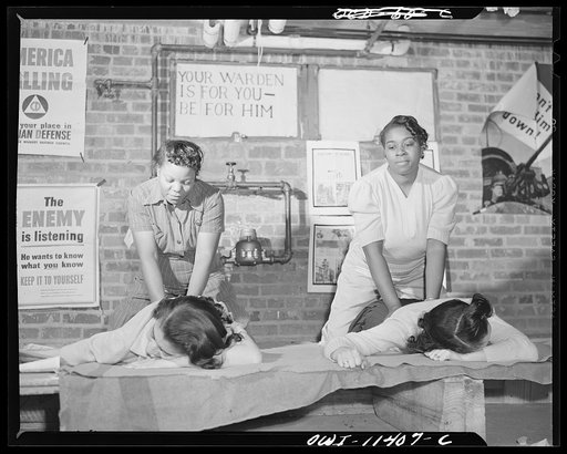 Washington, D.C. First aid class of the air raid warden unit in the Southwest area. Artifical respiration is demonstrated by two members of the class
