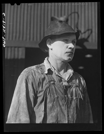 Untitled photo, possibly related to: Sunray, Texas. Worker at a carbon black plant with cream spread on his face to protect it from the black dust