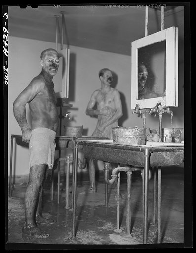Untitled photo, possibly related to: Sunray, Texas. Carbon black plant workers washing up at the end of the day