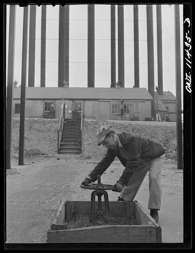 Untitled photo, possibly related to: Borger, Texas. Still man at the Phillips refinery