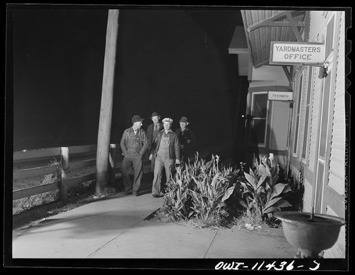 Amarillo, Texas. Railroad employees coming to work on a night shift at the Santa Fe Railroad yards
