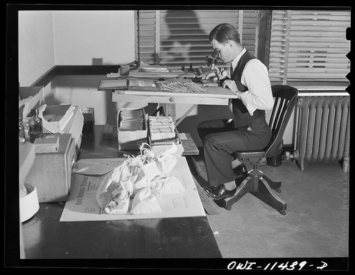 Amarillo, Texas. Geologist examing cuttings from wells being drilled in the Panhandle area by the Phillips Petroleum Company