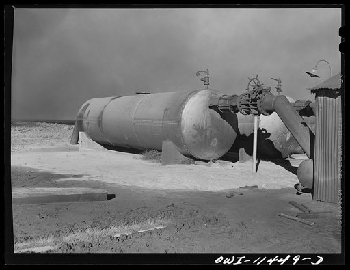 Sunray, Texas. Separator tanks through which natural gas from the Panhandle fields enters the carbon black plant