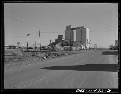 Untitled photo, possibly related to: Stratford, Texas. Oil and wheat storage in the Panhandle