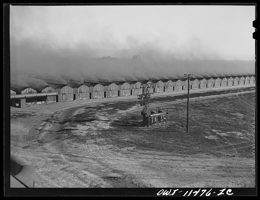 Untitled photo, possibly related to: Sunray, Texas. Carbon black plant. Gas is burned in 350 of these long low buildings called "doghouses"