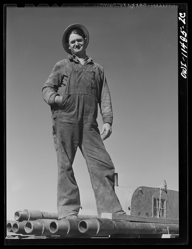 Sherman County, Texas. Roughneck on a core drilling crew