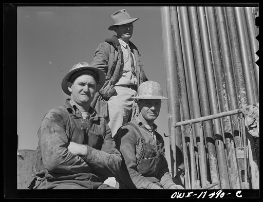 Sherman County, Texas. Geologist and two roughnecks on a core drilling crew