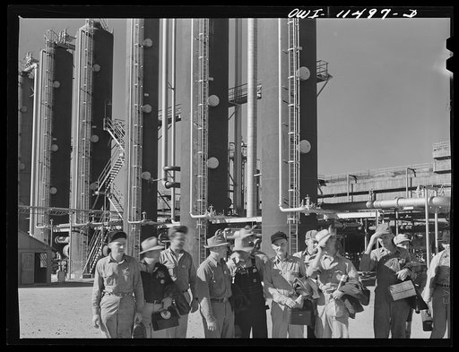 Untitled photo, possibly related to: Phillips refinery. Borger, Texas. Workers leaving the plant at a change of shift