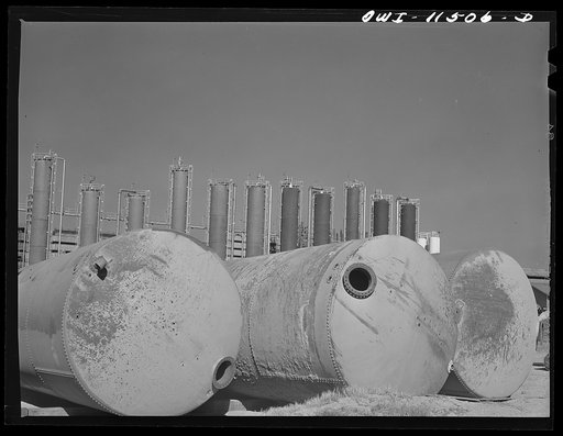 Untitled photo, possibly related to: Phillips refinery. Borger, Texas. Feed tanks and a still