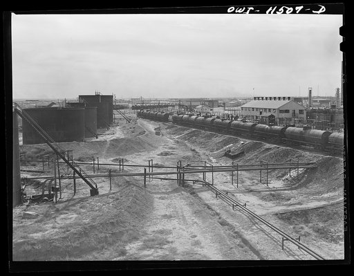 Phillips refinery. Borger, Texas. Loading rack with storage tanks and pipelines