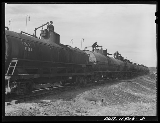 Phillips refinery. Borger, Texas. Loading tank cars with fuel oil