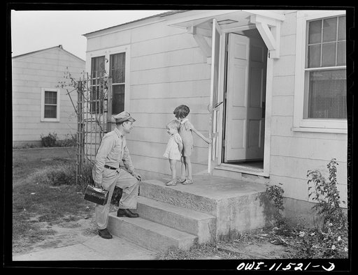 Phillips refinery. Borger, Texas. An employee leaving for work