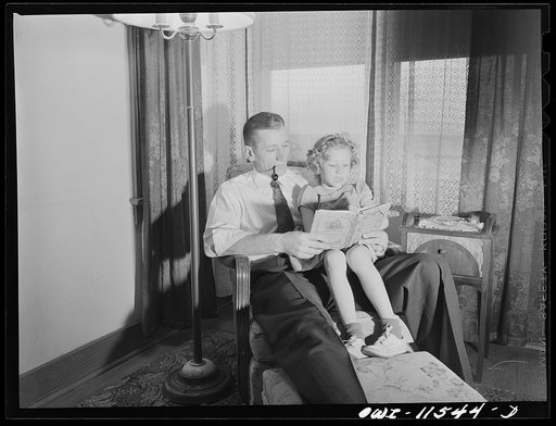 Borger, Texas. Refinery worker helping his daughter with her lessons