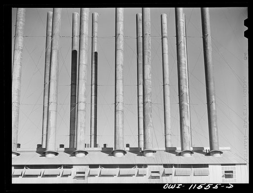 Untitled photo, possibly related to: Phillips refinery. Borger, Texas. Smokestacks on the powerhouse