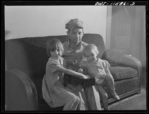 Borger, Texas. Refinery worker and child