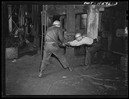 Phillips refinery. Borger, Texas. Refinery workers repairing a furnace