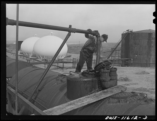 Untitled photo, possibly related to: Phillips refinery. Borger, Texas. Tank cars and storage tanks