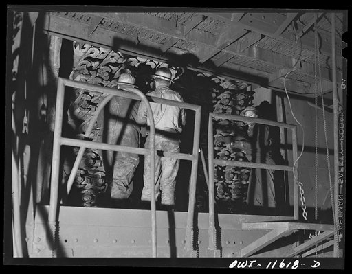 Untitled photo, possibly related to: Phillips refinery. Borger, Texas. Repairing a still