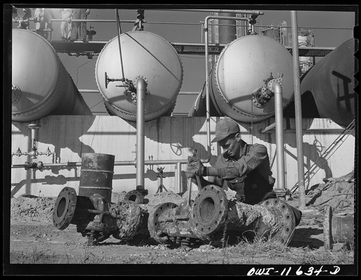 Phillips refinery. Borger, Texas. Repairing valve gate