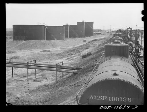 Untitled photo, possibly related to: Phillips refinery. Borger, Texas. Loading tank cars with fuel oil for shipment east