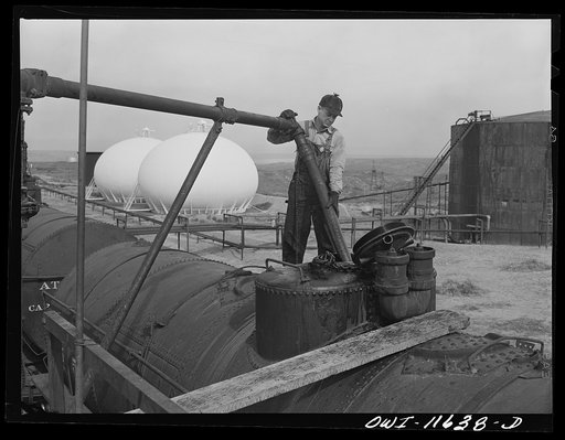 Phillips refinery. Borger, Texas. Loading tank cars with fuel oil for shipment east