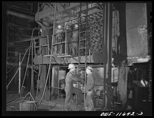 Phillips refinery. Borger, Texas. Repairing a still
