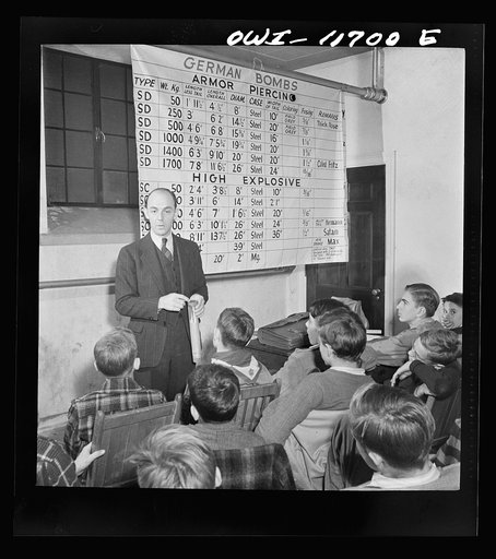 Lititz, Pennsylvania. Raymond Runk, accountant at the Animal Trap Company and fire captain, giving a lecture on German bombs to Boy Scouts who are learning to be messengers. In emergencies, their duty would be to report fire bombs to the proper people