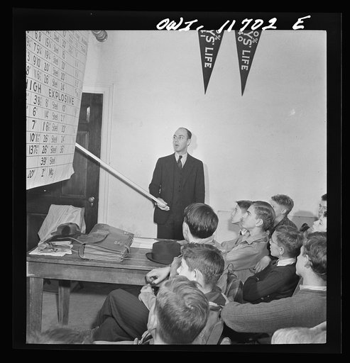 Lititz, Pennsylvania. Raymond Runk, accountant at the Animal Trap Company and fire captain, giving a lecture on German bombs to Boy Scouts who are learning to be messengers. In emergencies, their duty would be to report fire bombs to the proper people