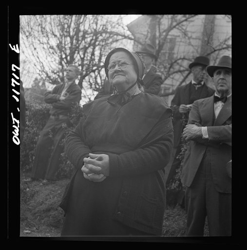 Untitled photo, possibly related to: Lititz, Pennsylvania. Mennonite woman at a public sale
