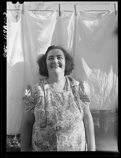 Lititz, Pennsylvania. Elizabeth Almoney, who has three sons and three brothers in the service, in her yard on Sunday