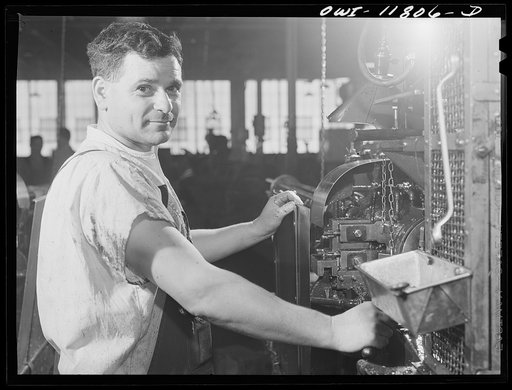 Lititz, Pennsylvania. This man is a German refugee who was a machine-gunner in the German army in the last war. Now he is making machine gun ammunition to fight Hitler