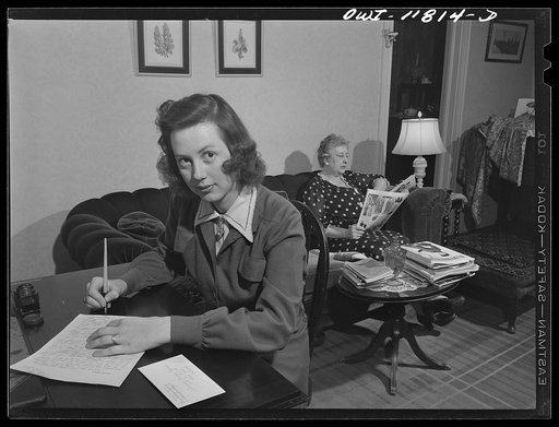 Untitled photo, possibly related to: Lititz, Pennsylvania. Mrs. Julian Bachman, twenty-three, has been married a year. Her husband is in Officers' Candidate School of the U.S. Army Air Corps in Kentucky, so she is living at home and works at the Animal Trap Company from 4 to 7. She spends her evenin