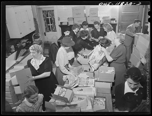 Lititz, Pennsylvania. The Lititz Service Association is made up of volunteers who pack a box of food and small luxuries once a month for every single boy from this town who is in the service, also for two girls, a WAAC (Women's Army Auxilary Corps) and a nurse. They raise money by voluntary donation